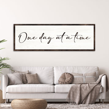 products/NON-2573---one-day-at-a-time-sign-2-16x48-mockup3.jpg